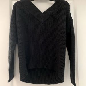 Off-the-shoulder black sweater